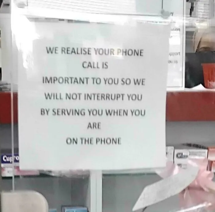 This Shop Sign