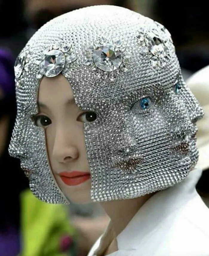 Intricate headpiece featuring multiple crystal faces showcasing flawless craftsmanship design