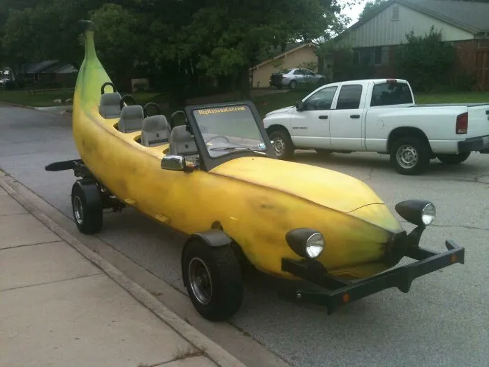 Weird banana-shaped car showing unhinged craftsmanship