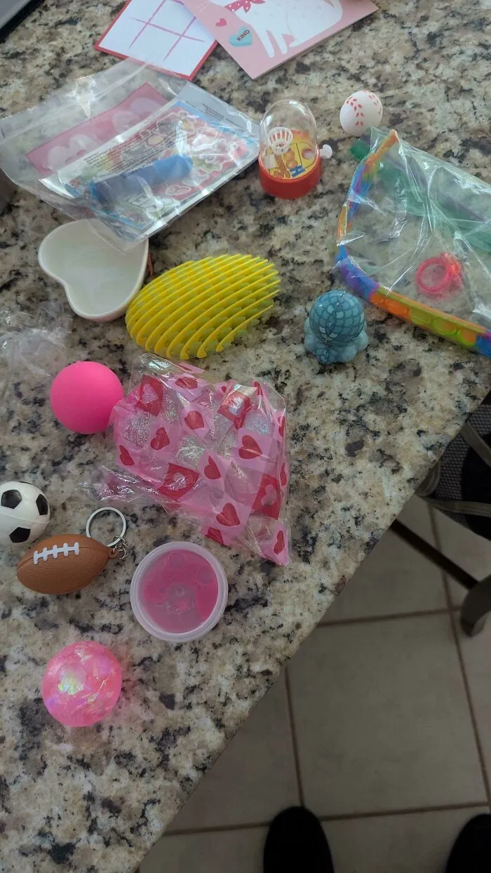 A collection of small toys and trinkets highlighting consumerism and price differences.