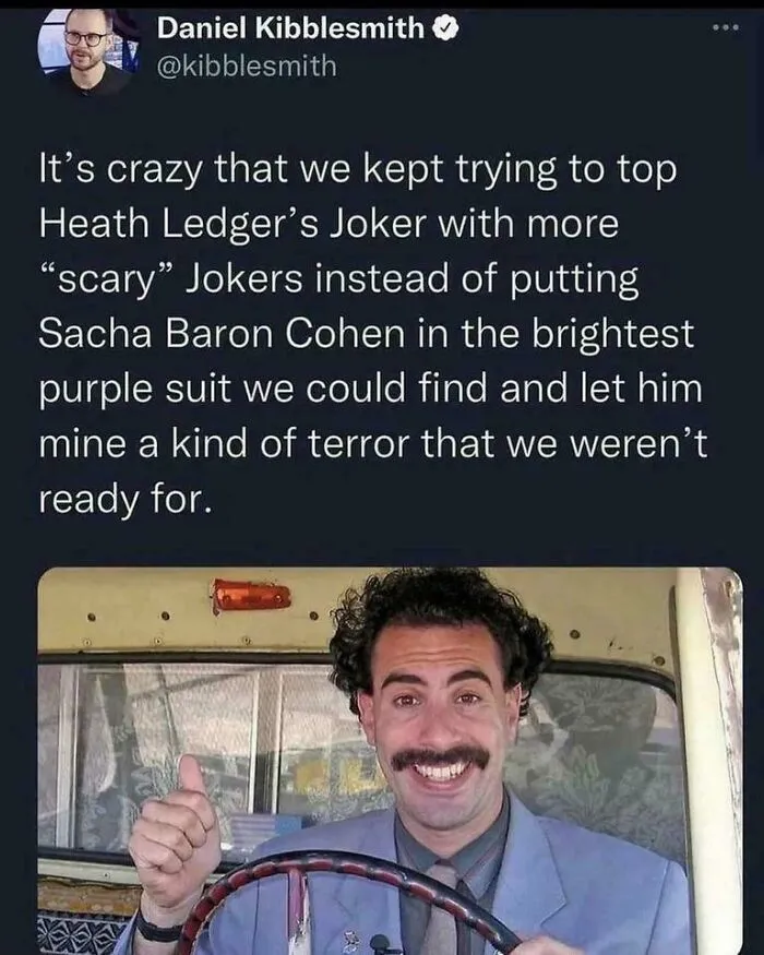 Screenshot of a unhinged social media post featuring a man in a purple suit with a humorous joker reference.