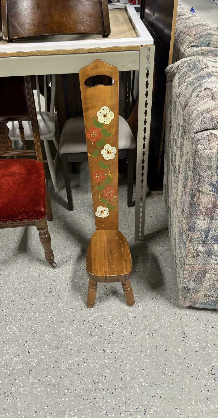 What Is This Chair With A Tall Back?