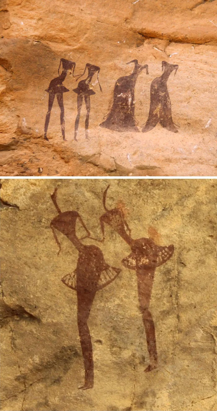 Ancient rock art depicting human-like figures, one pair dancing, showcasing fascinating artefacts that survived to this day.