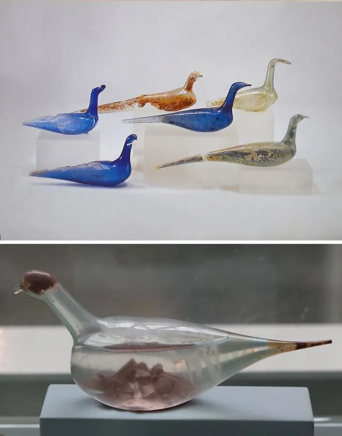Ancient glass bird-shaped artefacts displayed on stands, showcasing fascinating artefacts that survived to this day.