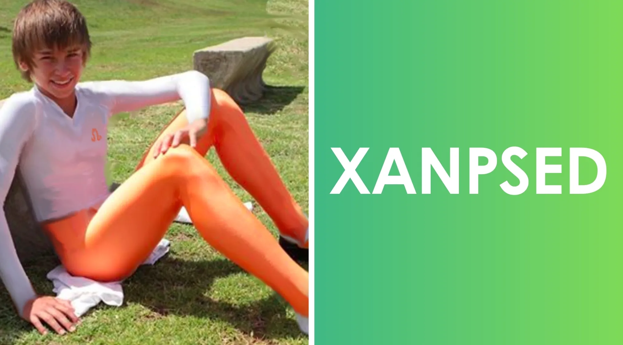 Boy wearing bright orange leggings made of lycra fabric sitting on grass next to a word scramble puzzle.