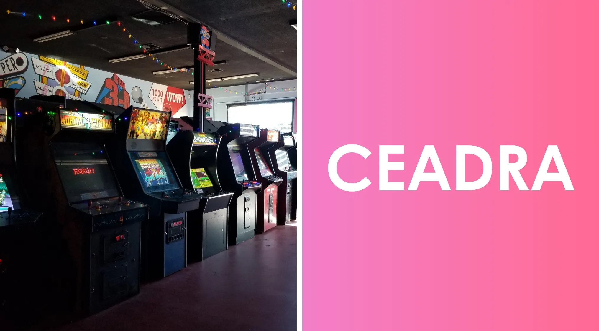 Row of classic arcade machines in a dimly lit entertainment venue featuring coin-operated games and colorful string lights.