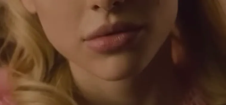 Close-up of a female celebrity’s mouth and lips with blonde hair, part of a guess the celebrity challenge.