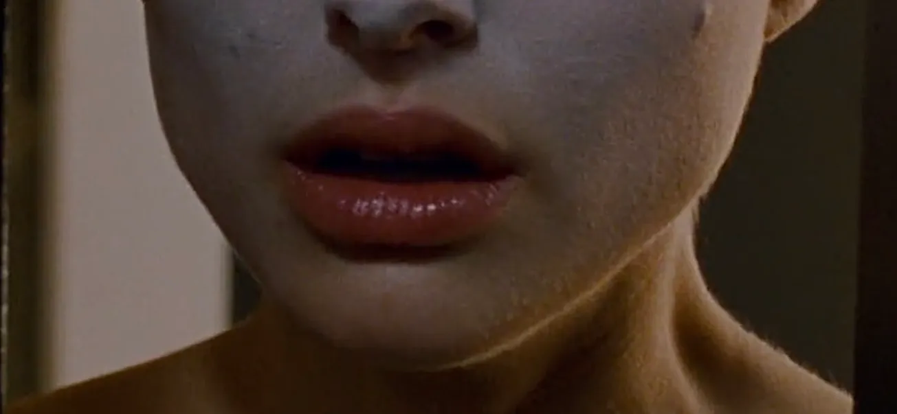 Close-up of a celebrity mouth showing lips and part of the chin for the guess the celebrity challenge.