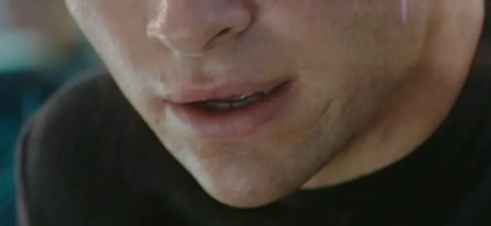 Close-up of a celebrity's mouth and chin in a guess the celebrity from their mouth challenge photo.