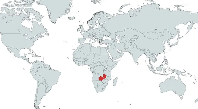 Map highlighting a country in red in southern Africa, focusing on identifying which country is marked on the map.