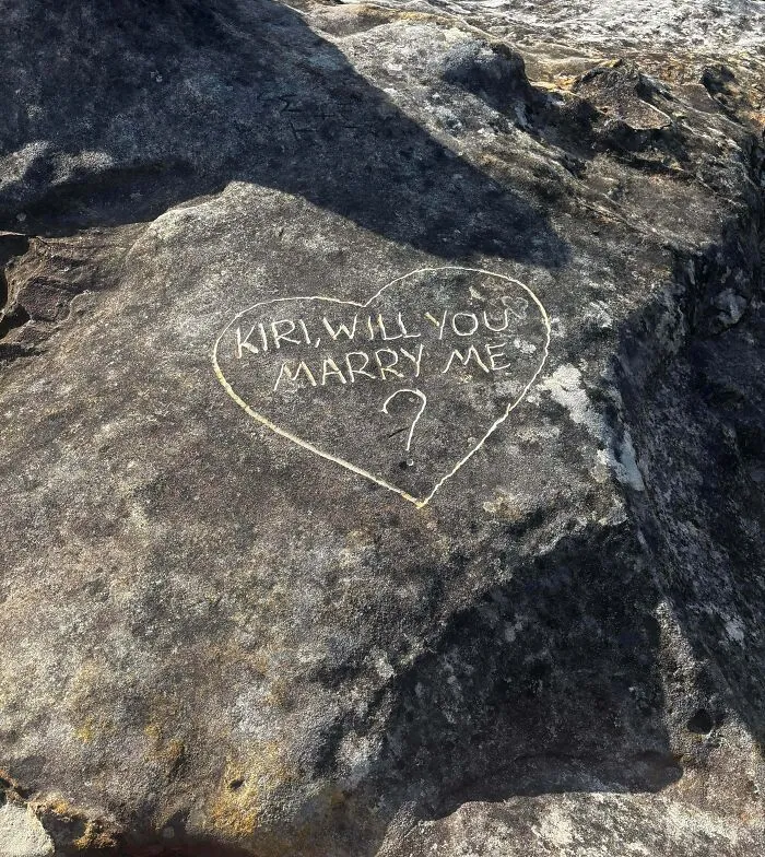 Etching Your Proposal Into Ancient Rocks At A Popular Look Out In The Blue Mountains