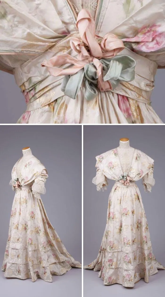 Vintage floral historical garment with bow detail, lace sleeves, and flowing skirt from a curated collection of historical garments.