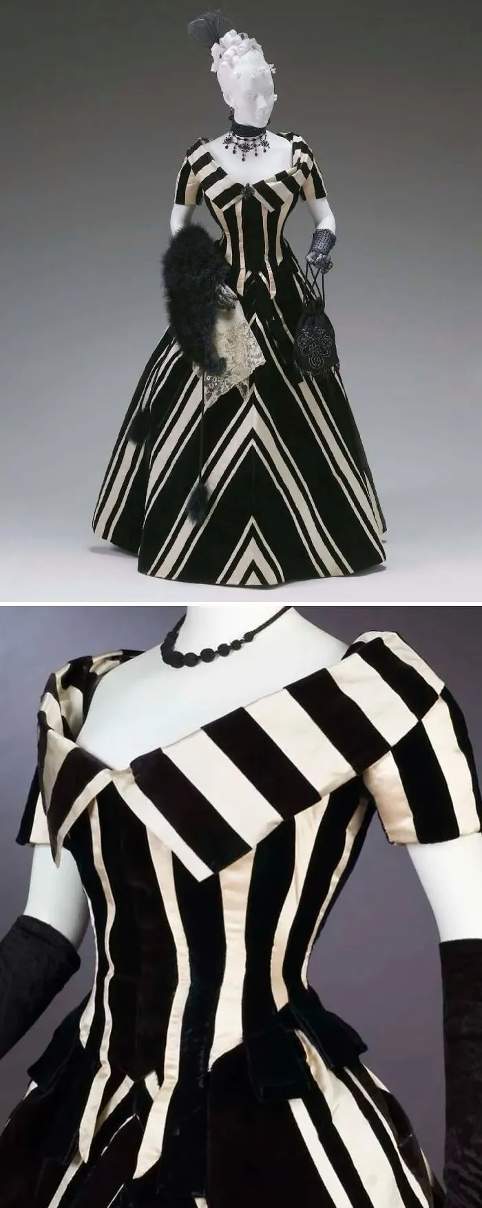Victorian historical garment with bold black and white stripes, featuring off-shoulder neckline and full skirt silhouette.