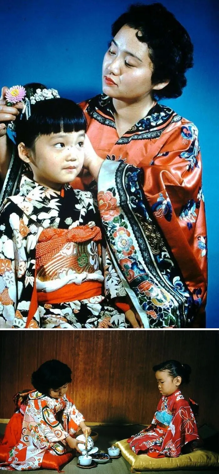 Mother and children wearing traditional historical garments in vibrant kimonos, showcasing cultural heritage and intricate designs.