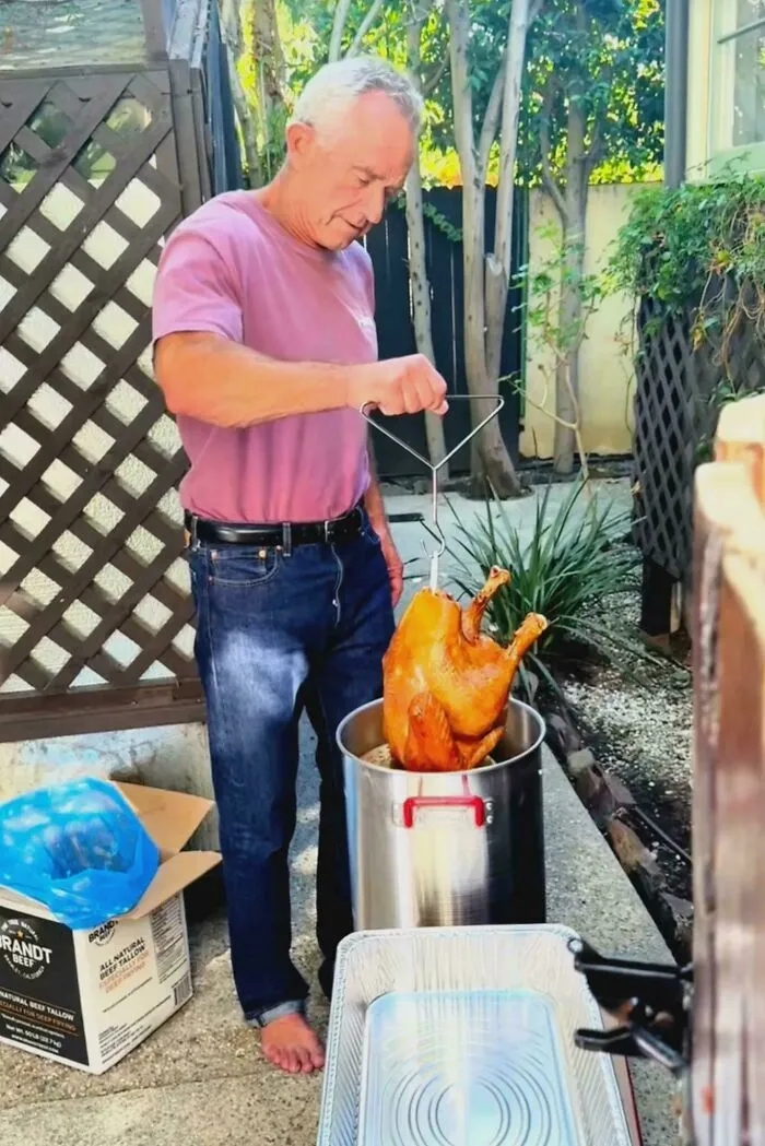 Dude Deep Frying A Turkey In Bare Feet