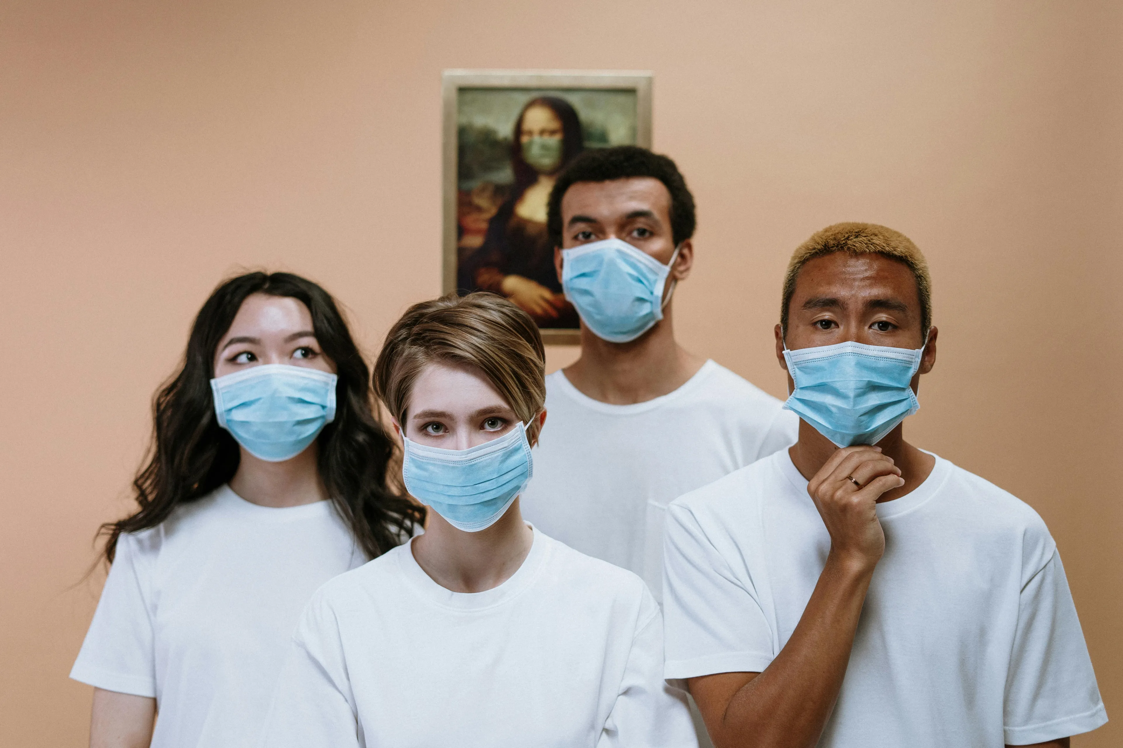 Group of diverse people wearing protective masks symbolizing pandemic and epidemic differences in health awareness.