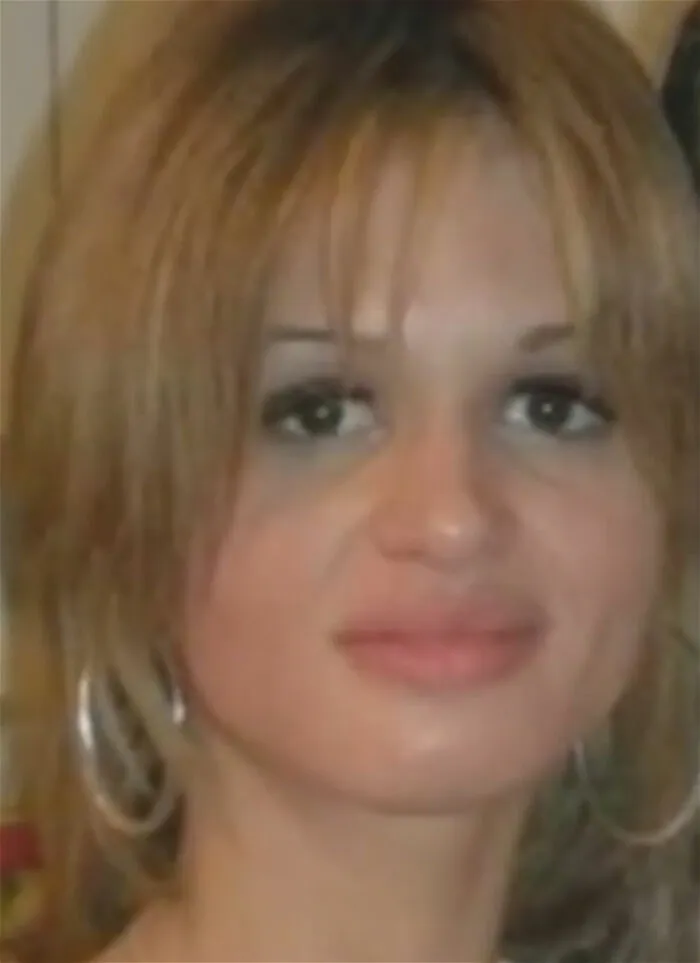 Close-up of a woman with light brown hair and hoop earrings, related to strange autopsy findings that surprised doctors.