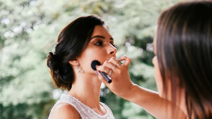 My (28F) cousin (23F) is getting married, and she asked me to do her makeup. She asked me what I would charge, and I offered to do it for free because she’s family and I wanted to be nice. However, I just RSVPed, and there was no option for a plus-one. I have a live-in, serious girlfriend and feel like I should be able to attend the wedding with her as my date, but the cousin said they’re at full capacity. I understand not allowing a plus one for everyone if it’s not in the budget, but as someone who is part of the wedding, I feel like I should be allowed a plus one.