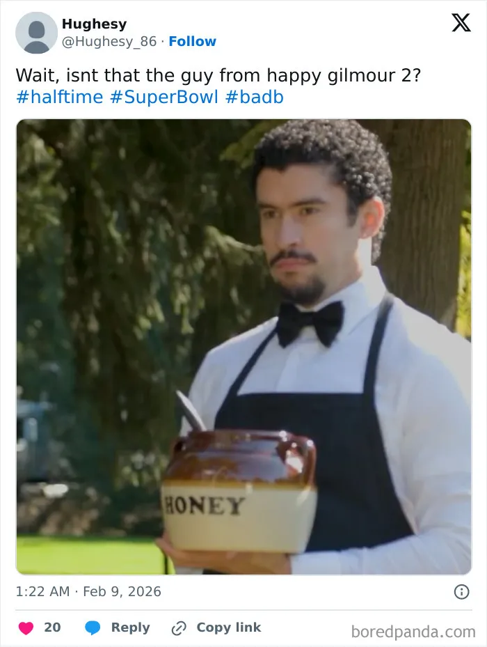 Man in a bow tie and apron holding a honey pot, featured in popular Super Bowl Lx halftime show reactions and memes.