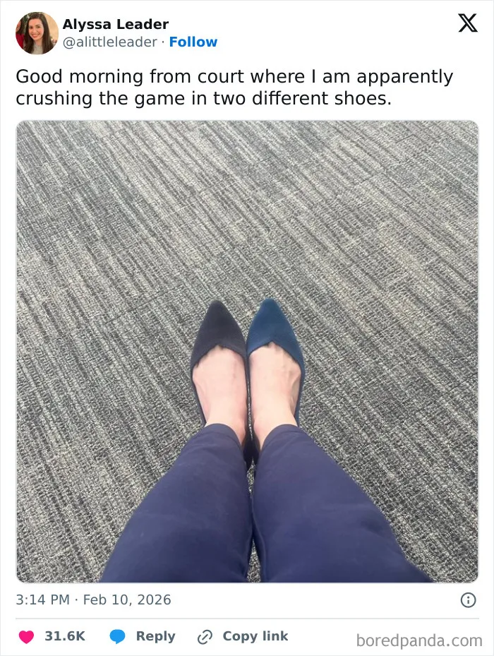Person sitting on carpeted floor wearing two different colored shoes in a chaotic and hilarious coping humor X post.