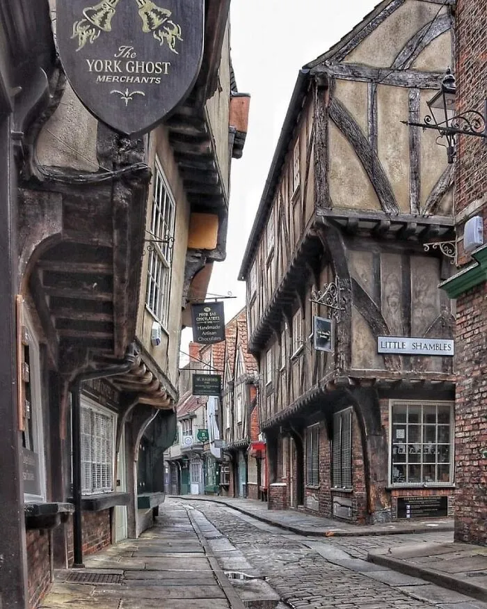 The Shambles Is A Historic Street In York, England, Celebrated For Its Beautifully Preserved Medieval Architecture And Charming, Picturesque Character
