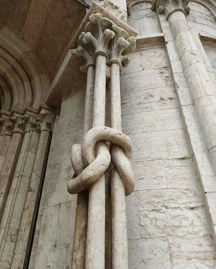 A Close-Up Of The Four Knotted Marble Columns At Trento Cathedral, Italy Carved In The 13th Century