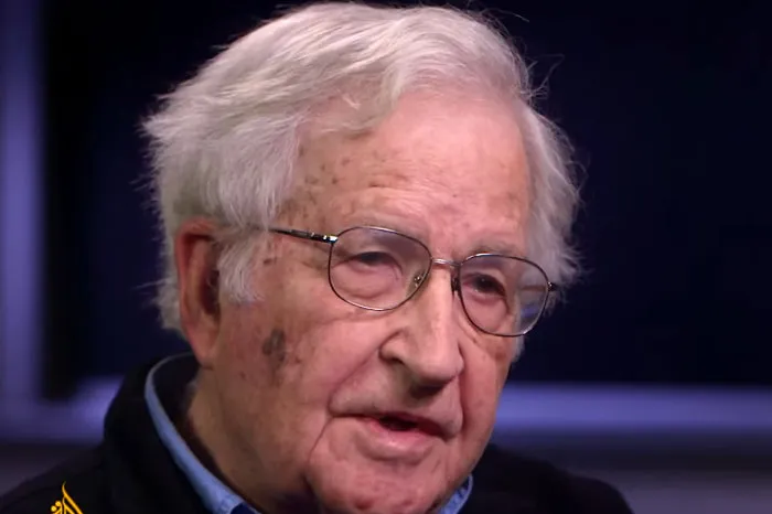Elderly man with white hair and glasses speaking in a close-up interview setting, related to Beyoncé fan loss topic.