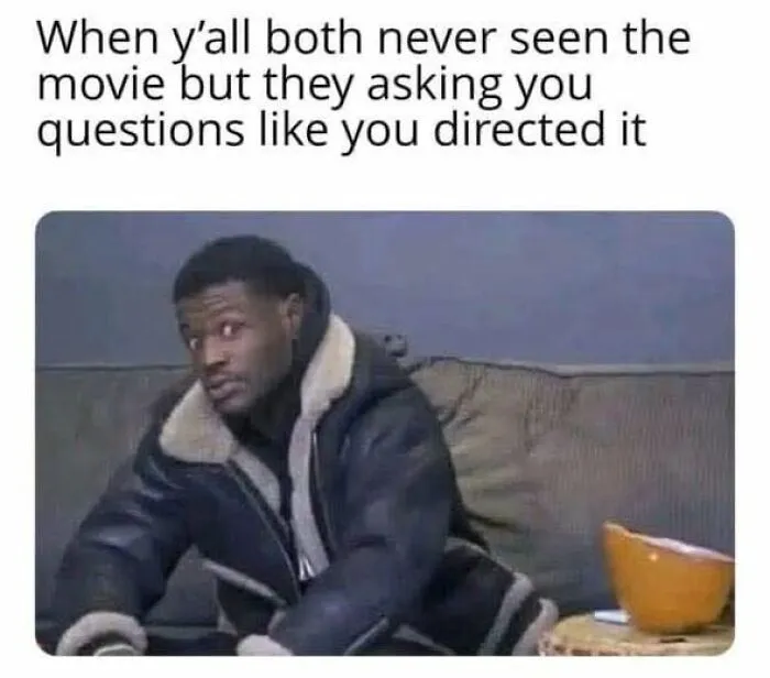 Man in a jacket sitting on a couch looking skeptical in a meme about feeling annoyed with confusing questions.