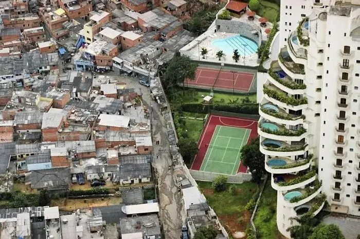 Brazil. City Of São Paulo, On The Border Of The Paraisópolis And Morumbi Neighborhoods
