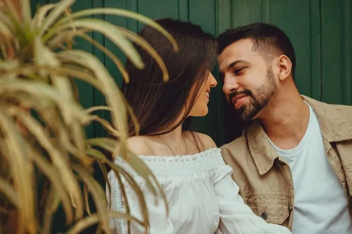 A couple sharing a close moment, illustrating how people silently judge others in everyday interactions.