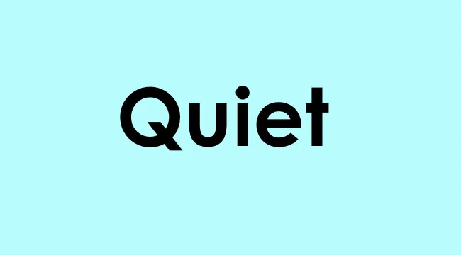 The word quiet shown in bold black font on a light blue background illustrating word meaning.