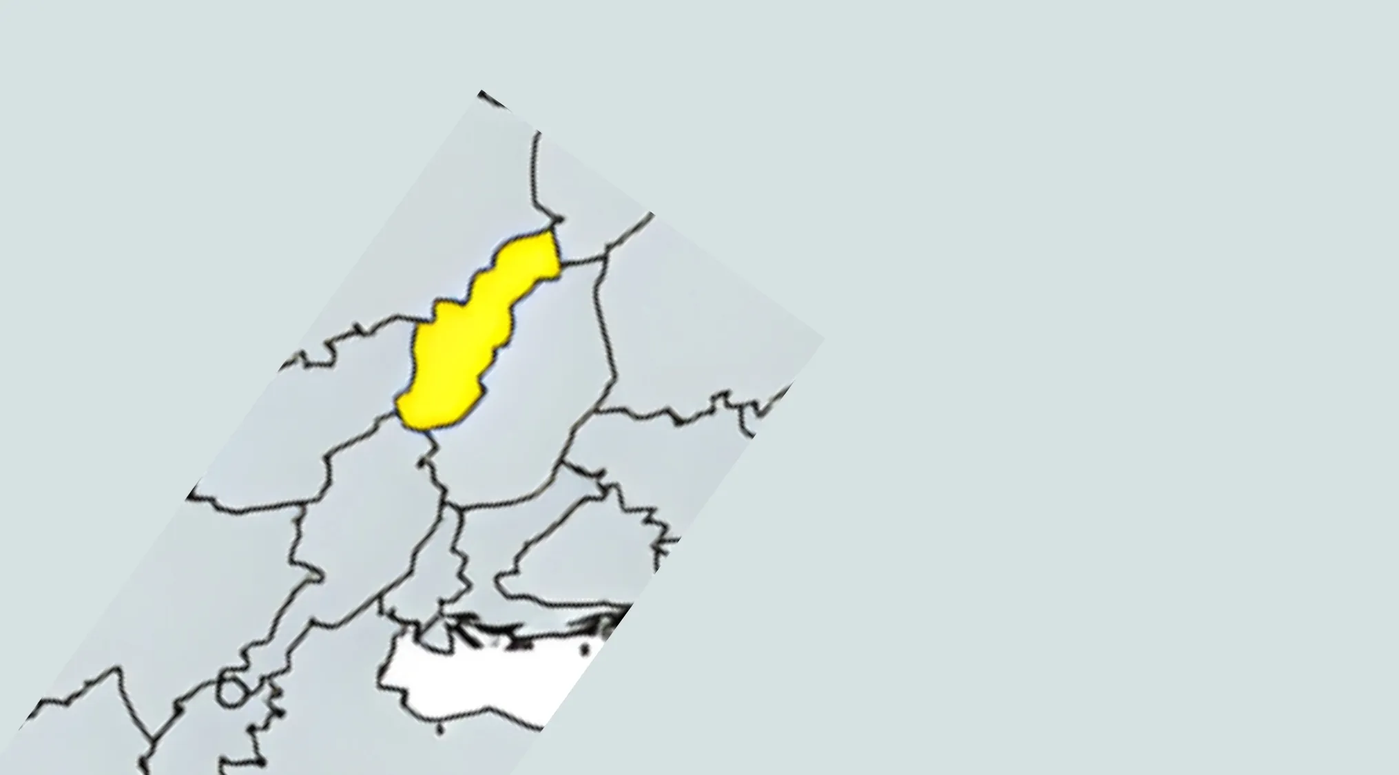 Partial map showing a country highlighted in yellow for the guess the country from the crazy map quiz.