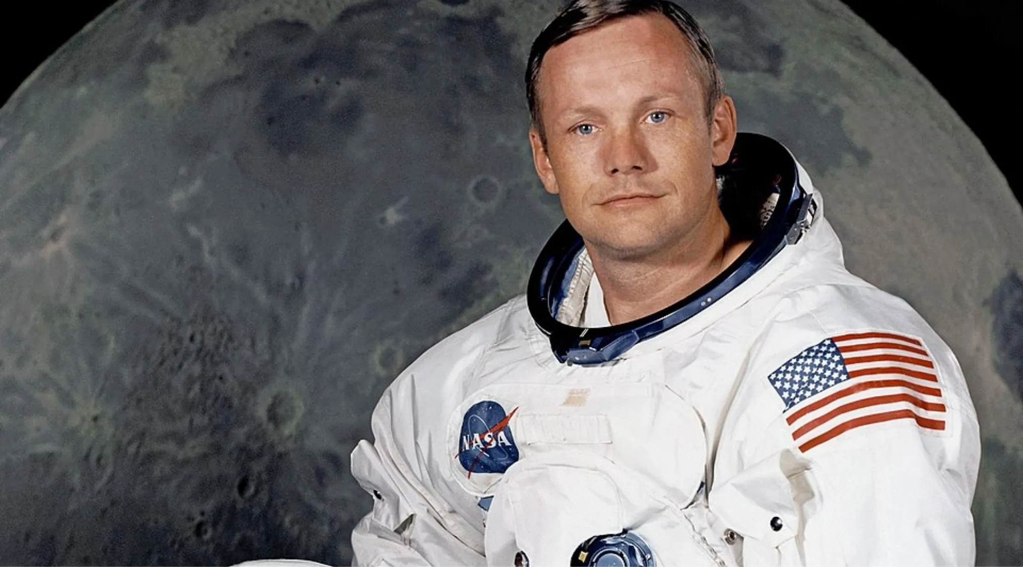 Astronaut in a NASA suit with the Moon in the background representing the first person who walked on the Moon.