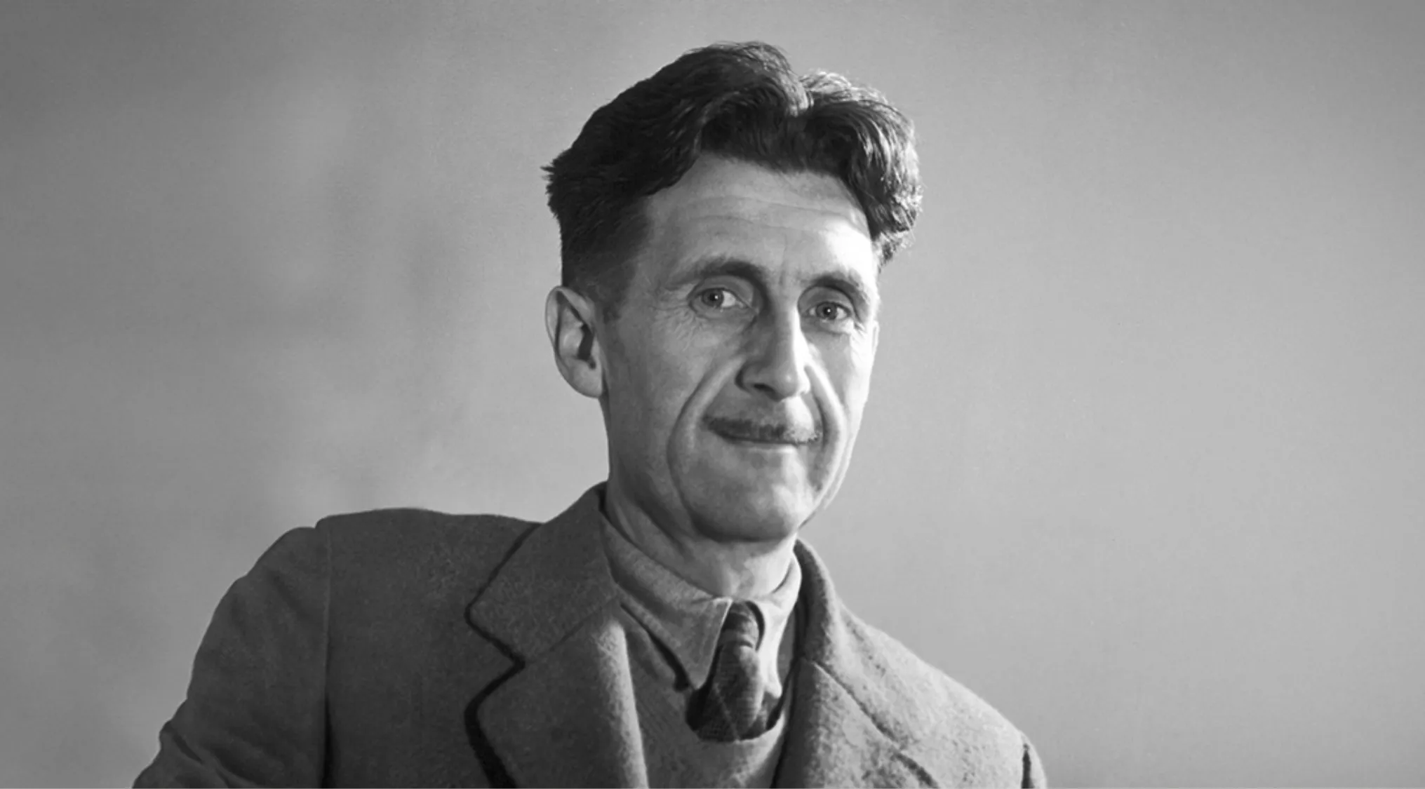 Black and white portrait of the author of 1984 and Animal Farm, a famous literary figure and novelist.