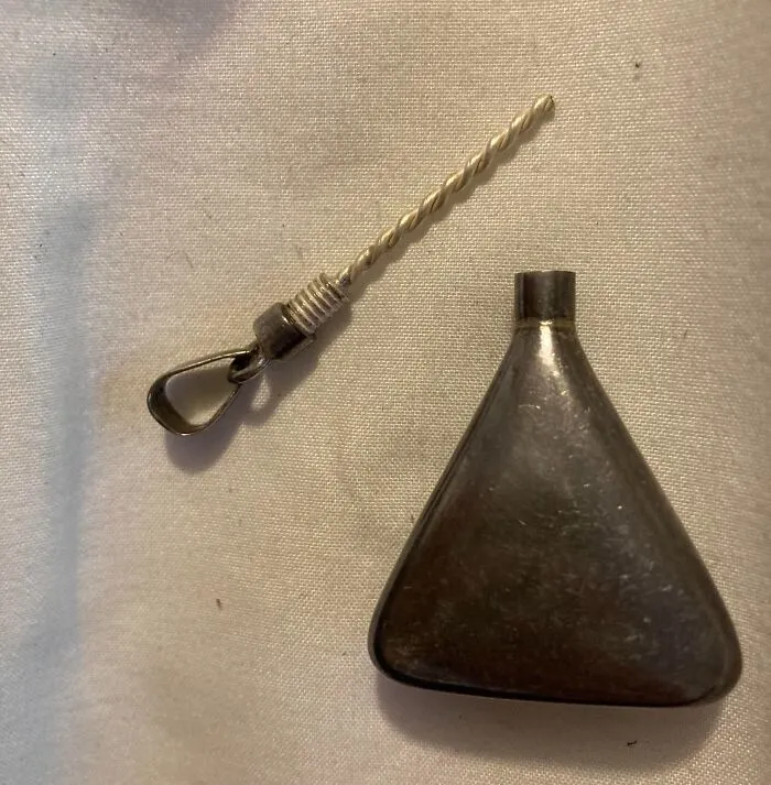 Unidentified metal objects with twisted wire and clip, part of 69 times the internet solved mystery of unidentified objects.