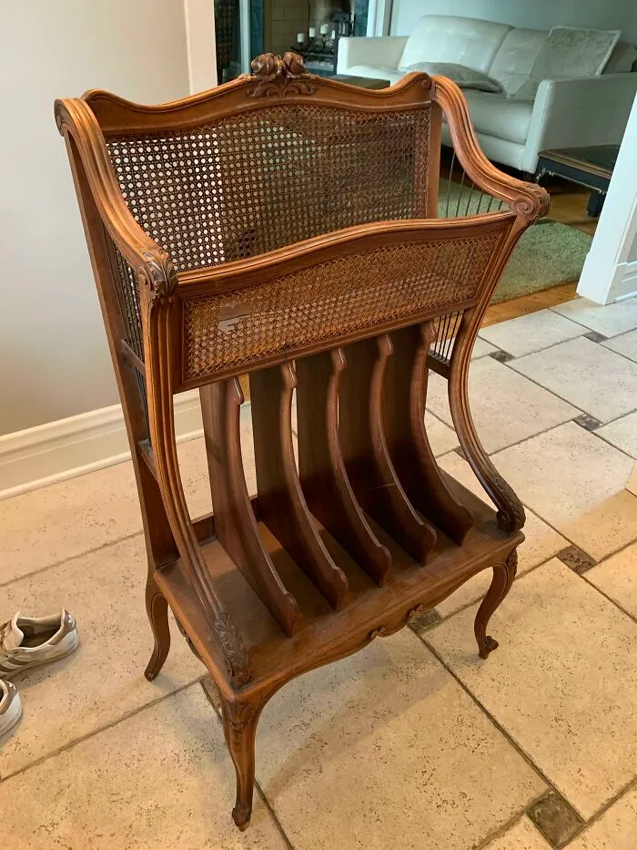 Vintage wooden furniture piece with woven cane panels and dividers, featured in internet mysteries of unidentified objects.