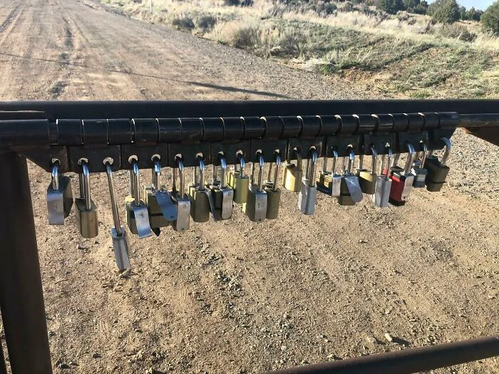 This Is A On Gate Blocking Road Access To Some Cell Towers. Why So Many Locks, And How Would Someone Even Open It?