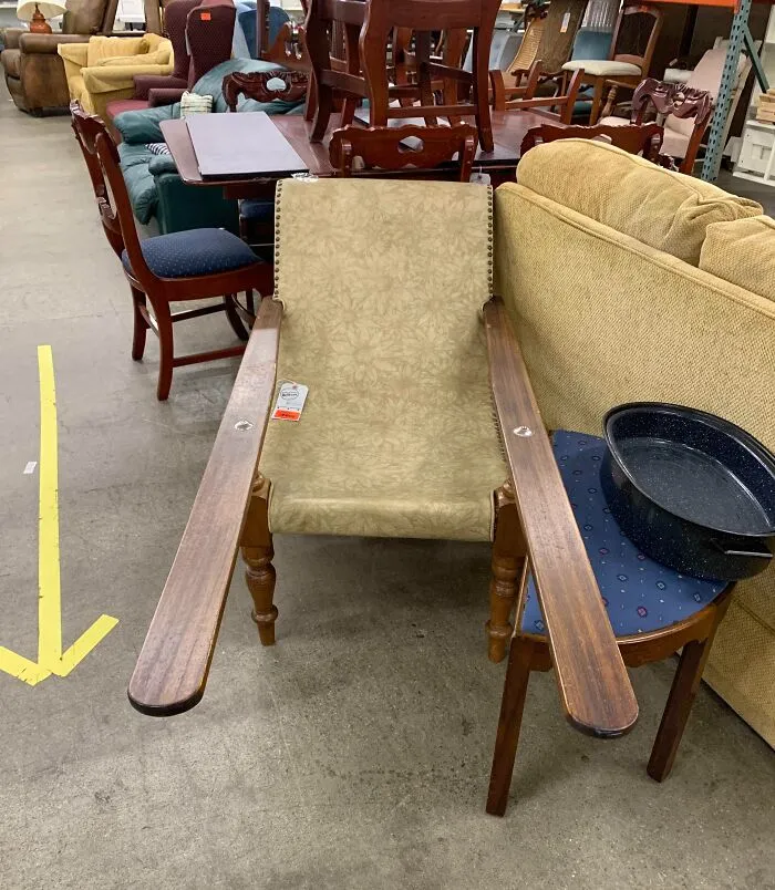Ok, I Know It’s A Chair, But What’s With The Extended Arms?