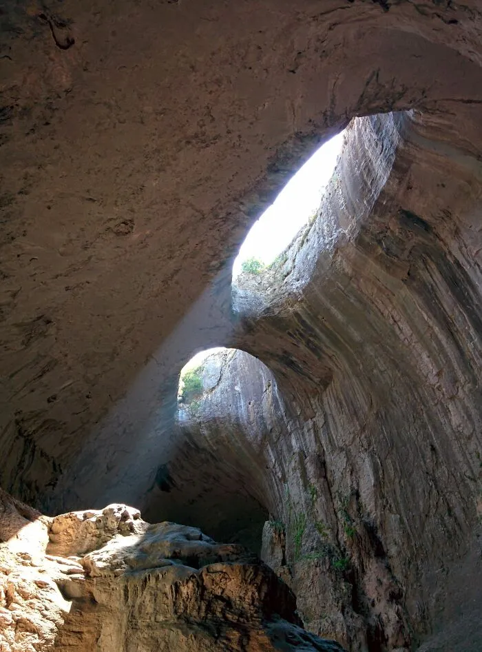 This Bulgarian Cave Has Giant “Eyes” In The Ceiling, And Here Are 15 Photos Capturing It