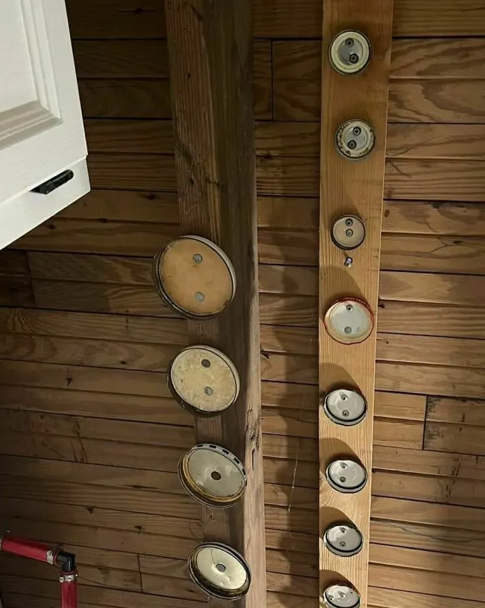 Old House Mystery. Why Are There Jar Lids Attached To The The Basement Ceiling?? House Dates Back Yo The 1950s