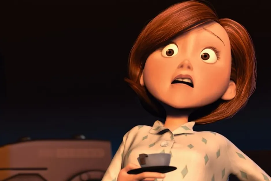 Elastigirl from The Incredibles with short red hair holding a cup, showing a shocked expression in a dark setting.