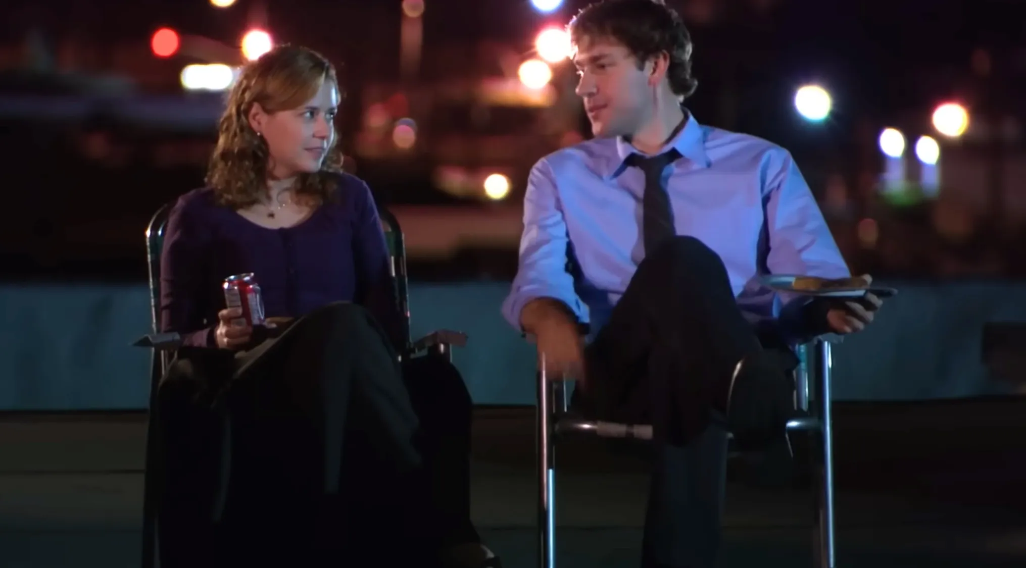 Fictional couples sitting outdoors at night sharing food and drinks in a TV show scene quiz.