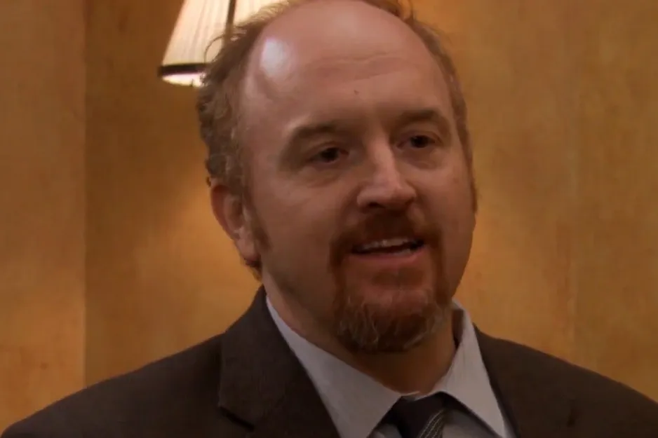 Middle-aged man in a suit portraying a character from Parks and Recreation, related to Leslie Knope's husband.