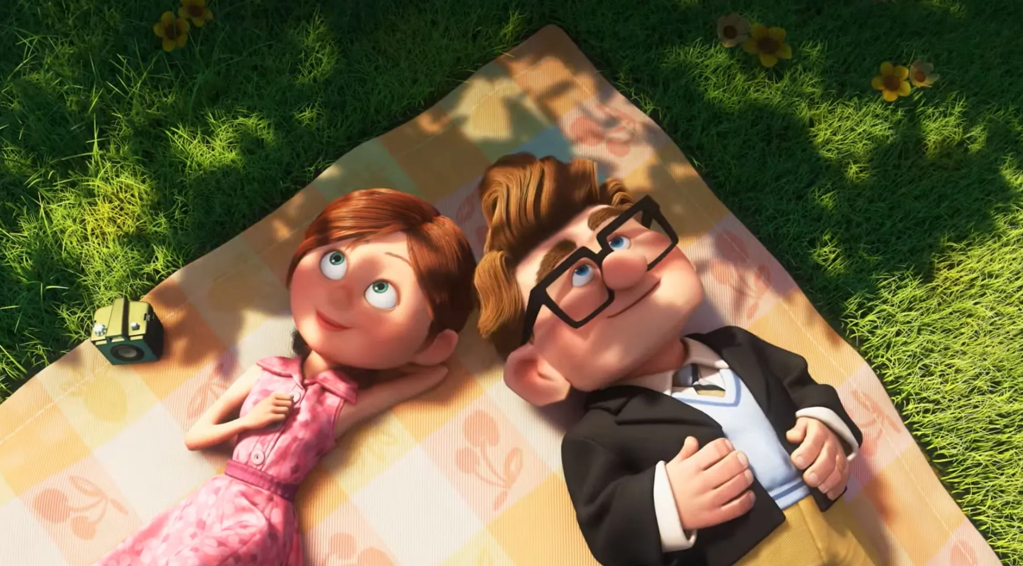 Animated fictional couple lying on a picnic blanket in a grassy area, from an animated film quiz scene.