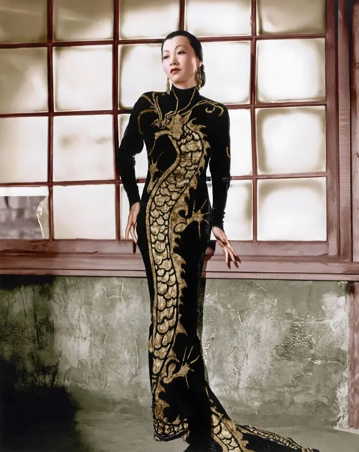 Anna May Wong Wearing Her Iconic Silk Charmeuse Dress Embroidered With Gold And Silver Sequins In A Dragon Motif Designed By Travis Banton For Her Role In The 1934 Hollywood Film Limehouse Blues