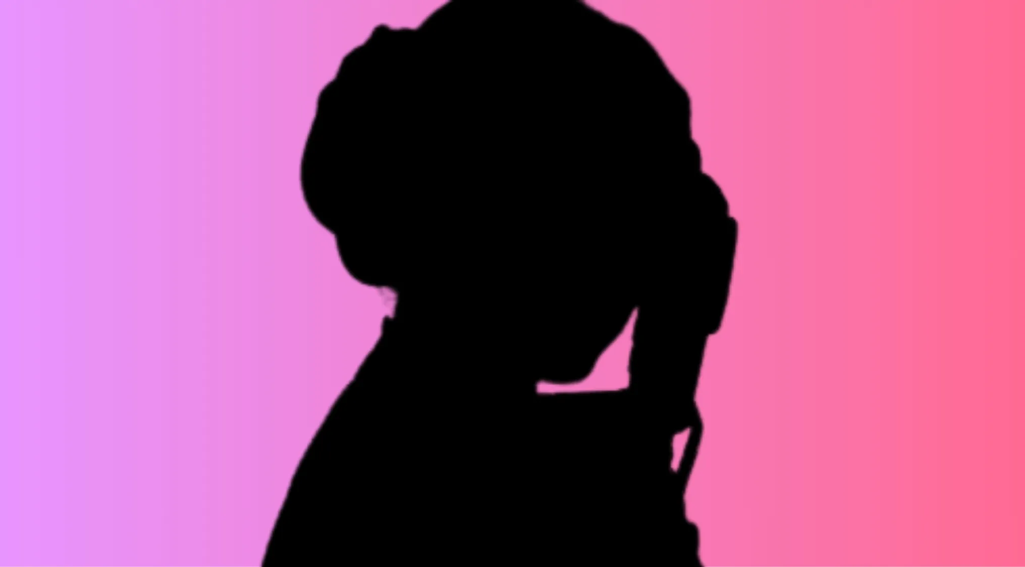 Silhouette of a movie character against a pink and purple gradient background from a popular movie franchise quiz.