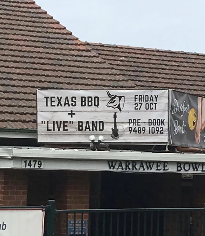 Sign with hilariously suspicious quotation marks around the word live for Texas BBQ and band event on a building facade.