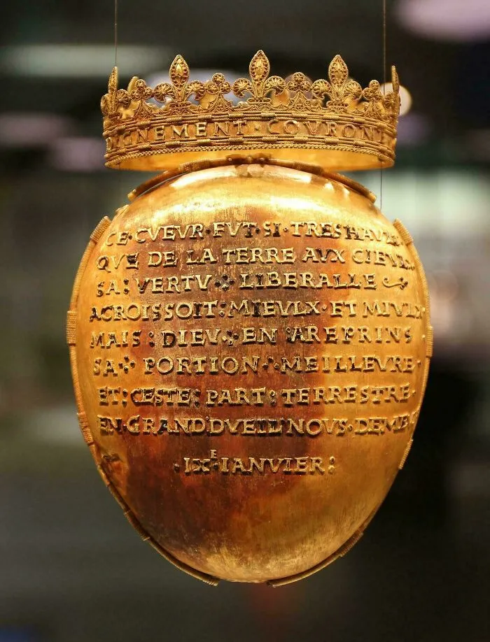 A crowned gold reliquary shaped like a heart, one of many fascinating historical finds from antiquity.