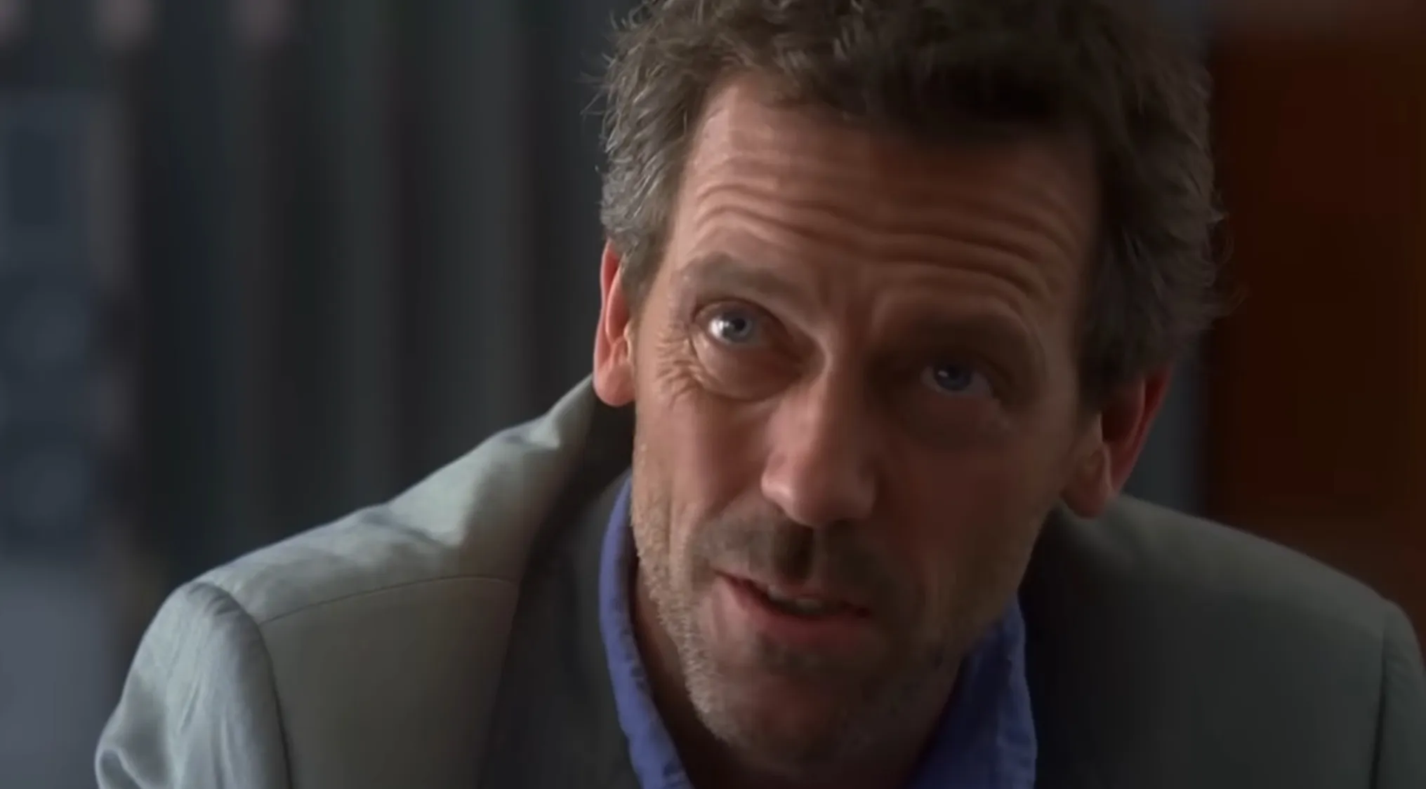 Close-up of Dr. Gregory House in a scene from the TV show House, focusing on famous last words quiz content.