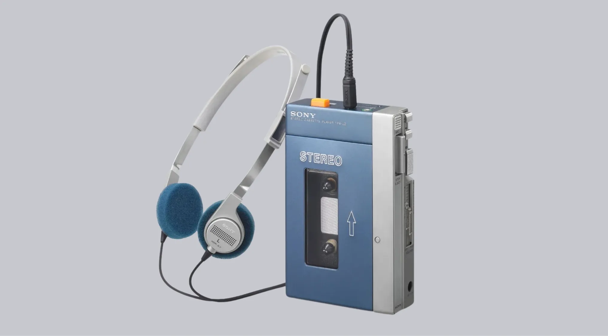 Sony portable music player Walkman with blue foam headphones against a plain gray background.